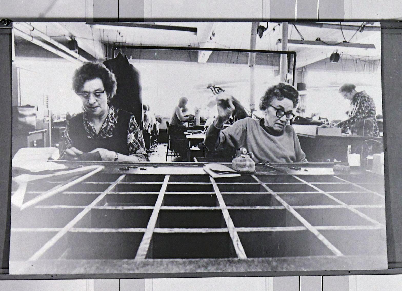 Panel from ‘Women and Work’ 1975 shows two women working in a textile factory.